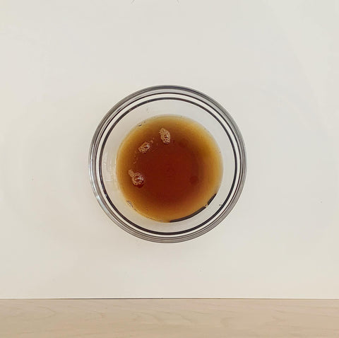 Close up of maple syrup in a glass bowl